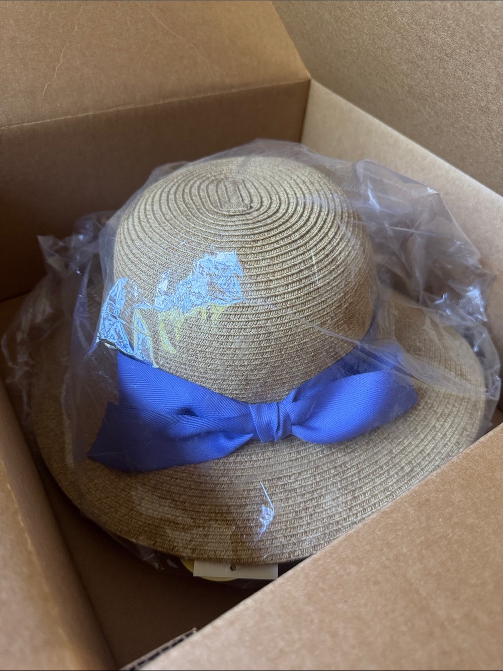 Ladies Tan Straw Sun Hat with Blue Ribbon Bow